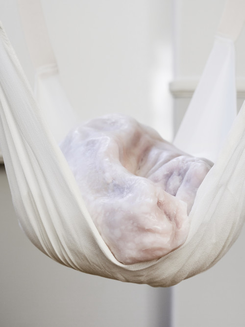 Ivana Basic, Disintegration in the direction of something other than death #2, 2014. Wax, silk, weight, elastic bands, cushioning, 14 x 16 x 11 in (36 x 41 x 28 cm) (Full height variable)