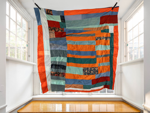Utē Petit, Evil Travels in Straight Lines, 2020. Found bed sheets from the Lucky Inn Motel, boat sail from I-75, upholstery, fabric from Granny and denim dresses, 84 x 84 in, 213 x 213 cm