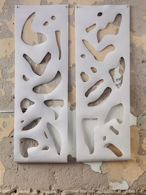 Alex Ebstein, Stretching Specters 5 and 6, 2014. Handcut yoga mats and nickel-plated grommets, 72 x 24 in, 183 x 61 cm