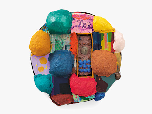 Brian Belott, Tondo Puff, 2019. Cotton batting, colorfast paper, acrylic paint, matte medium, remote control with matte medium, colored sand and stones, 21 x 21 x 5 in (53 x 53 x 13 cm)