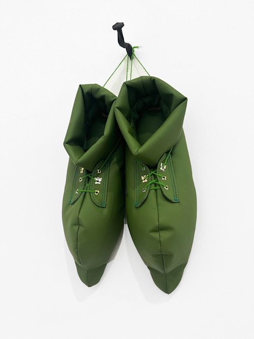 Konrad Lidén, Apprentice's shoes, 2024. Faux leather, eyelets, wadding, wool thread, wire, 18 x 8 in (45 x 21 cm)