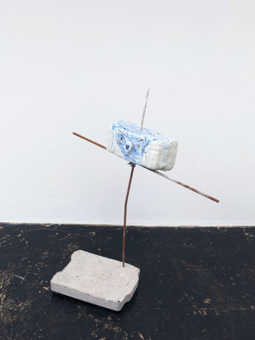 Jenny Kalliokulju, Smirk, 2015. Concrete, rebar, paper clay, enamel, acrylic, porcelain knob