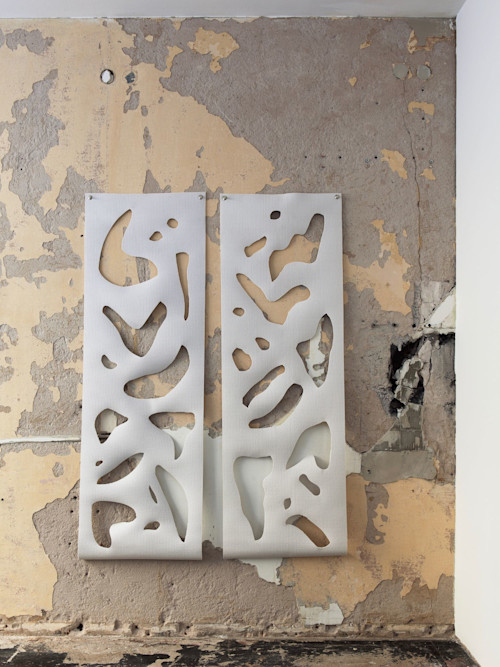 Alex Ebstein, Stretching Specters 5 and 6, 2014. Handcut yoga mats and nickel-plated grommets, 72 x 24 in, 183 x 61 cm