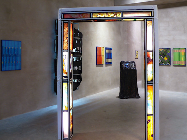 Urethane plastic, pigment, vinyl, foam, wood, acrylic paint, lighting 96 x 65 x 10 in, 244 x 165 x 26 cm