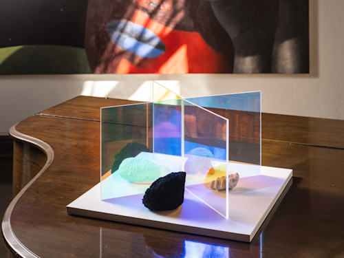 Christian Sampson, El Royale Coral-Sponge Projector-Reflector, 2025. Acrylic, Dichroic Films, Sea Sponges, Cast Coral, Wood Plinth, 20 x 14 x 14 in (51 x 36 x 36 cm) 